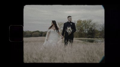 Bride and groom walking through a Texas field at golden hour