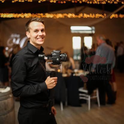 Wesley Blalock filming a wedding reception with handheld gimbal